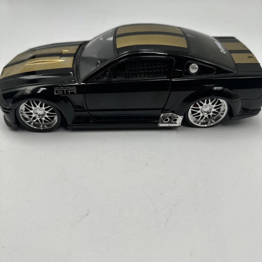 Jada Toys Dub City Ford Mustang GTR 1/24 Black Gold Stripes Diecast Model Car